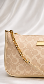 Compact beige printed bag showing gold and stylish finish for women in pakistan