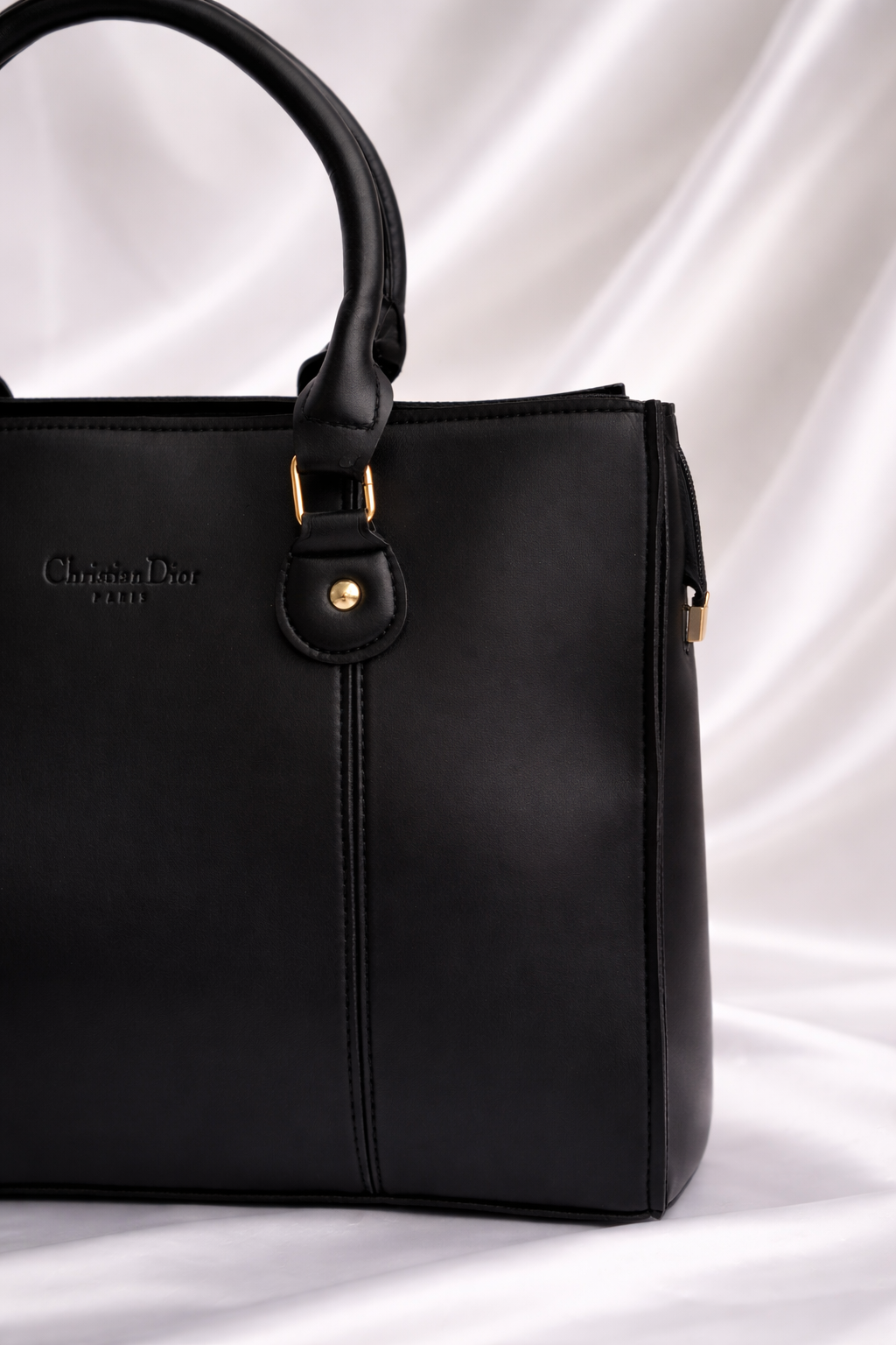 Large black leather-style tote bag with spacious interior for working ladies in Pakistan