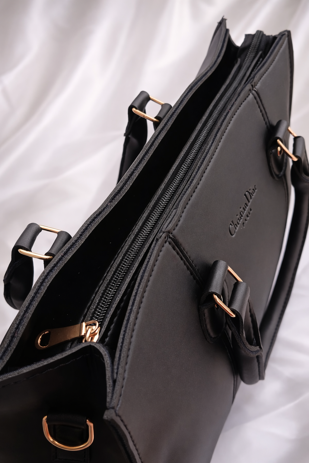 Professional black handbag for girls in Pakistan featuring durable straps and minimalist design for formal wear - Silslah Store