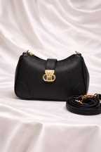 Black pebbled leather crossbody bag with adjustable strap for daily use in Pakistan