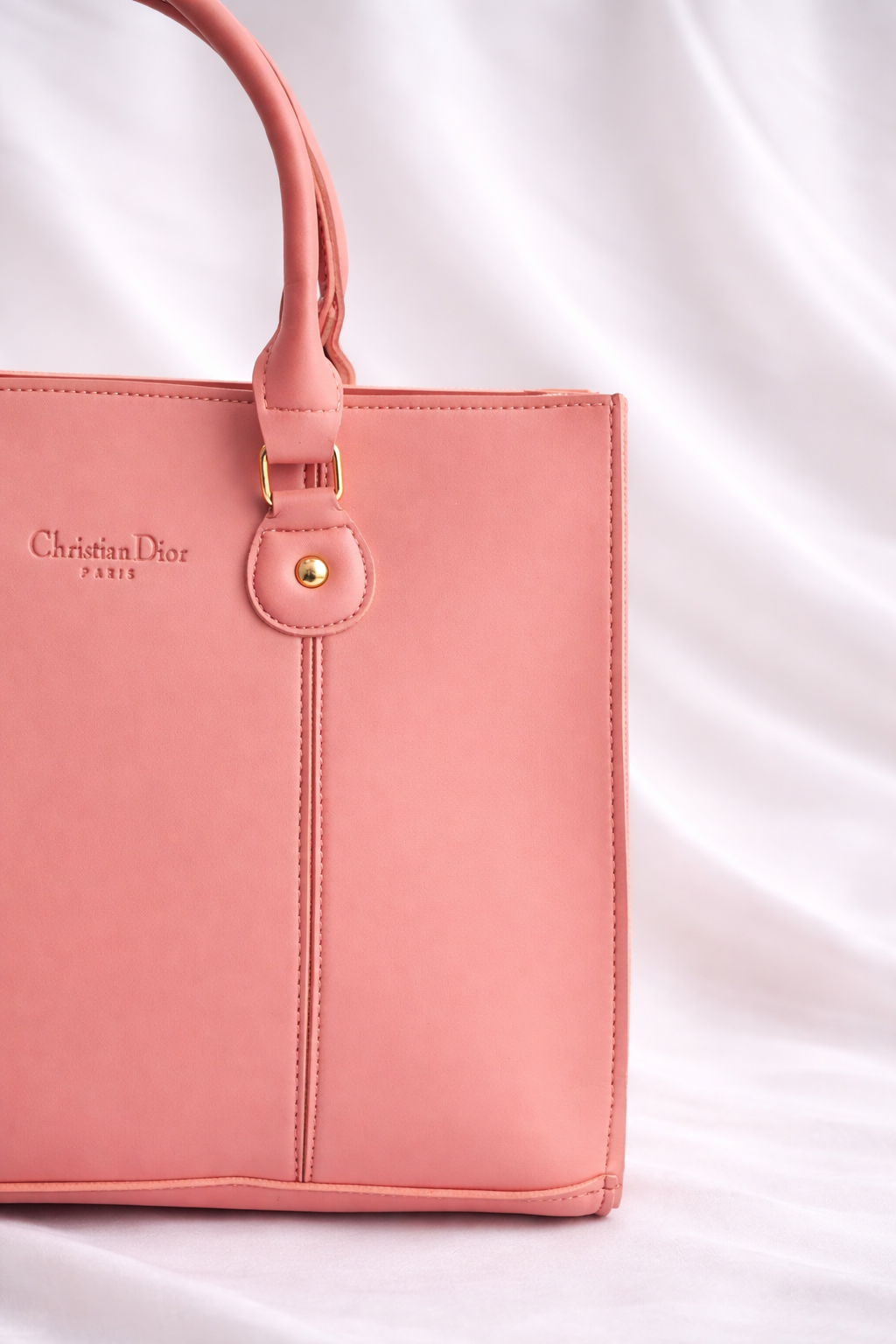 Elegant and spacious pink shoulder bag for women with a professional structured look