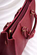 Minimalist burgundy handbag for girls in Pakistan with strong shoulder straps and spacious interior for daily essentials - Silslah Store
