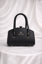 Stylish black embossed leather handbag with crystal clasp and silver frame - Silslah Store