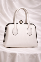 Premium white embossed leather handbag with pearl crystal clasp for Pakistani weddings season