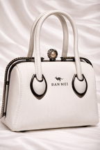 Luxury white embossed leather handbag with pearl crystal clasp for Pakistani wedding seasons