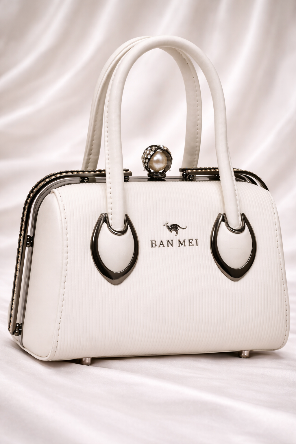 Premium white embossed leather handbag with pearl crystal clasp for Pakistani weddings