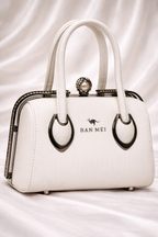 Premium white embossed leather handbag with pearl crystal clasp for Pakistani weddings