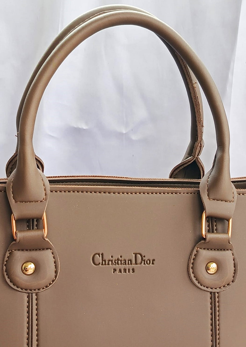 Elegant mushroom brown Shoulder bag for girls in Pakistan featuring durable handles and minimalist design for everyday carry - Silslah Store
