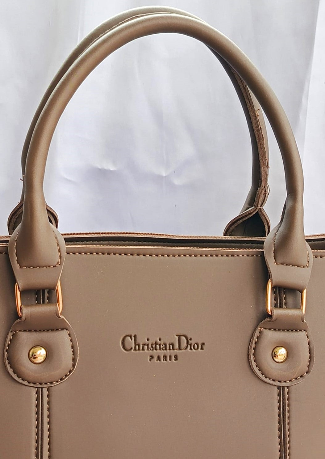 Elegant mushroom brown Shoulder bag for girls in Pakistan featuring durable handles and minimalist design for everyday carry - Silslah Store