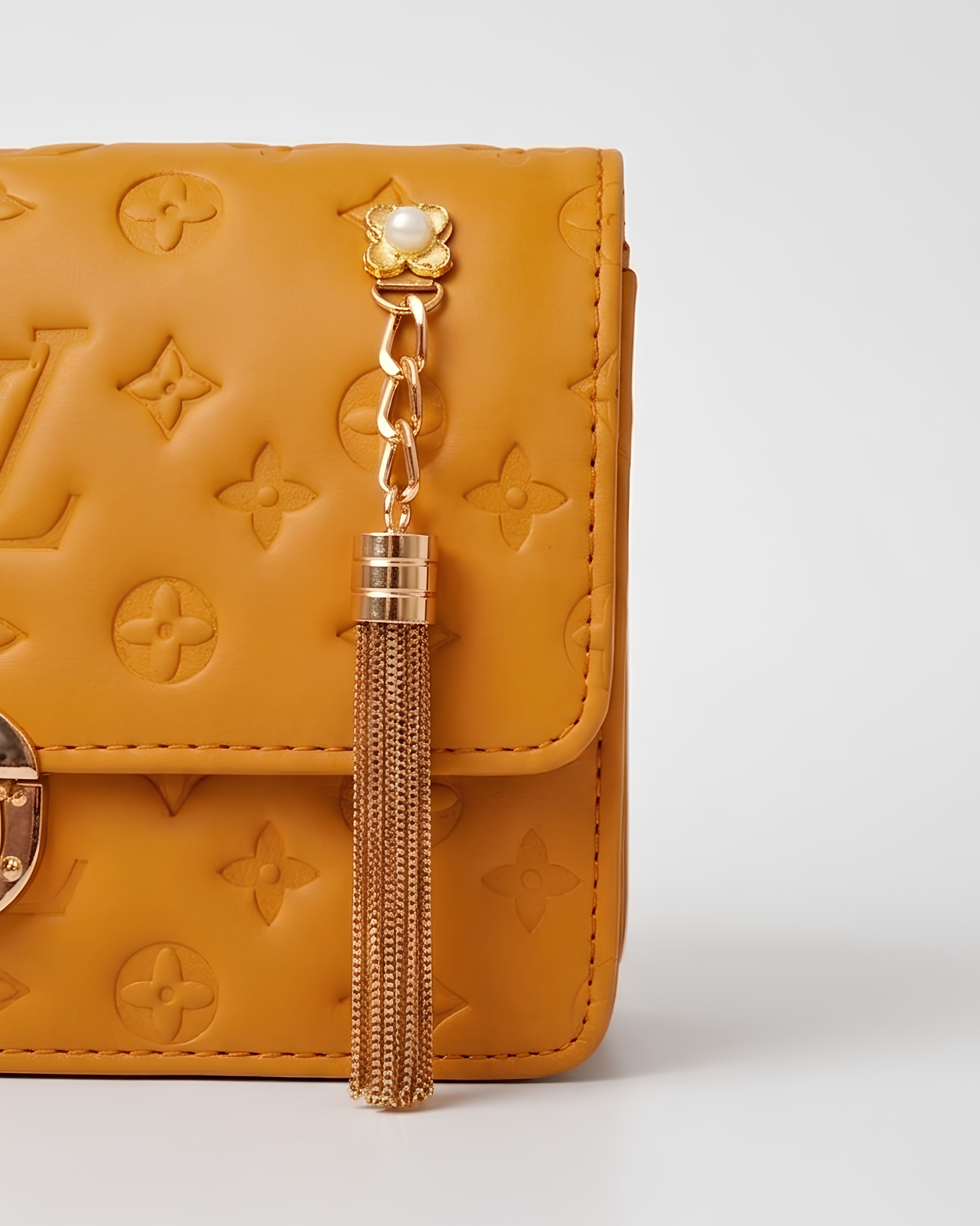Mustard Embossed Bag for Women with Gold Detailing and Chain Strap