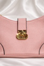Soft pink pebbled leather finish with luxury gold detailing and durable stitching for long lasting use