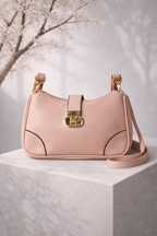 Soft pink pebbled leather finish with durable stitching for long lasting use