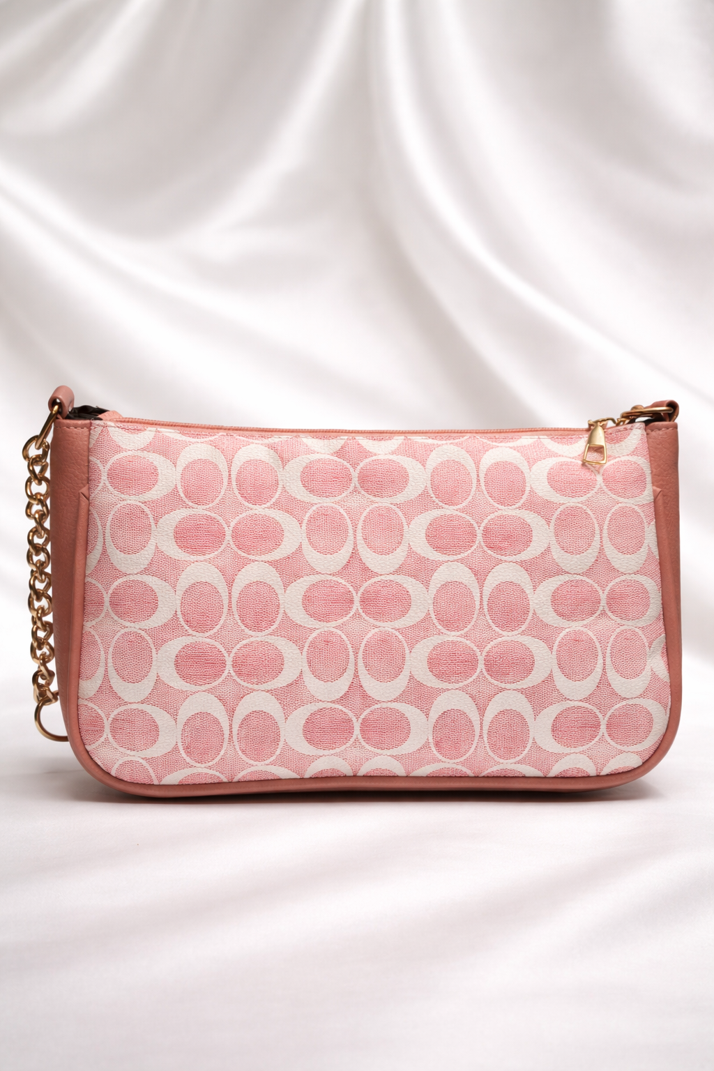 Small pink printed clutch bag perfect for weddings and formal events in Pakistan