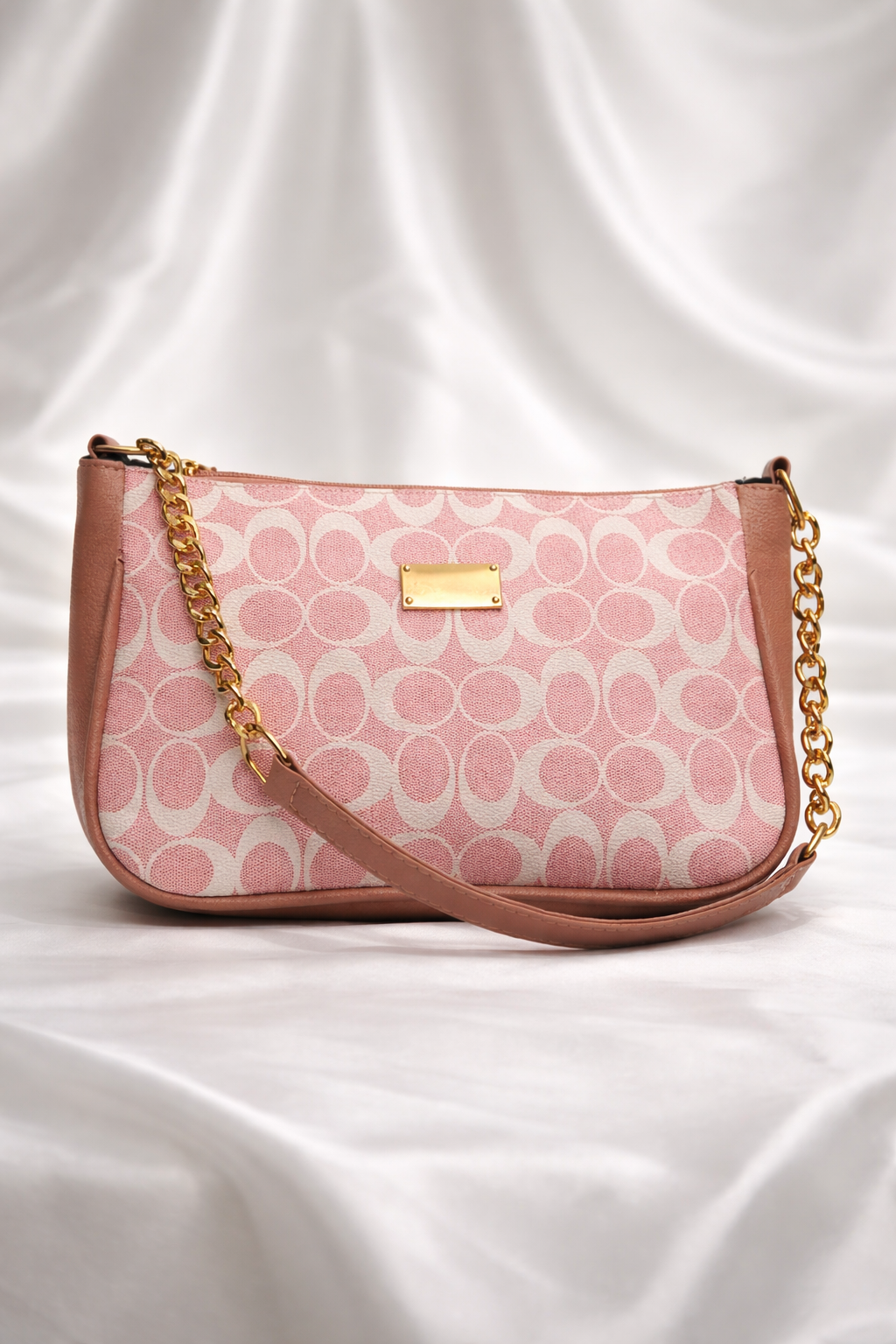 Elegant pink printed handbag for parties, outing, dinners, gathering in pakistan