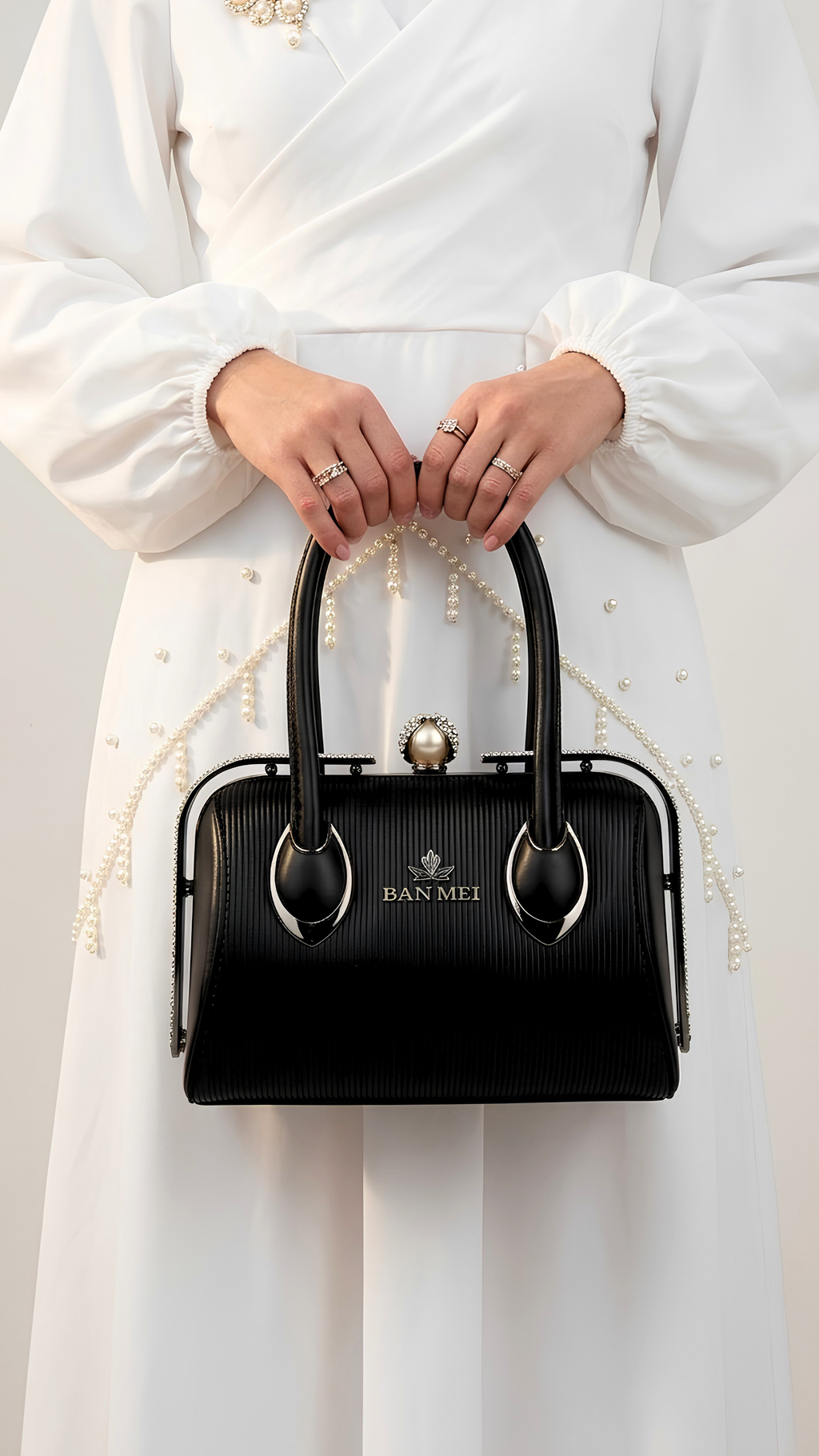 Premium white embossed leather handbag with pearl crystal clasp for Pakistani weddings