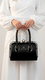 Premium white embossed leather handbag with pearl crystal clasp for Pakistani weddings