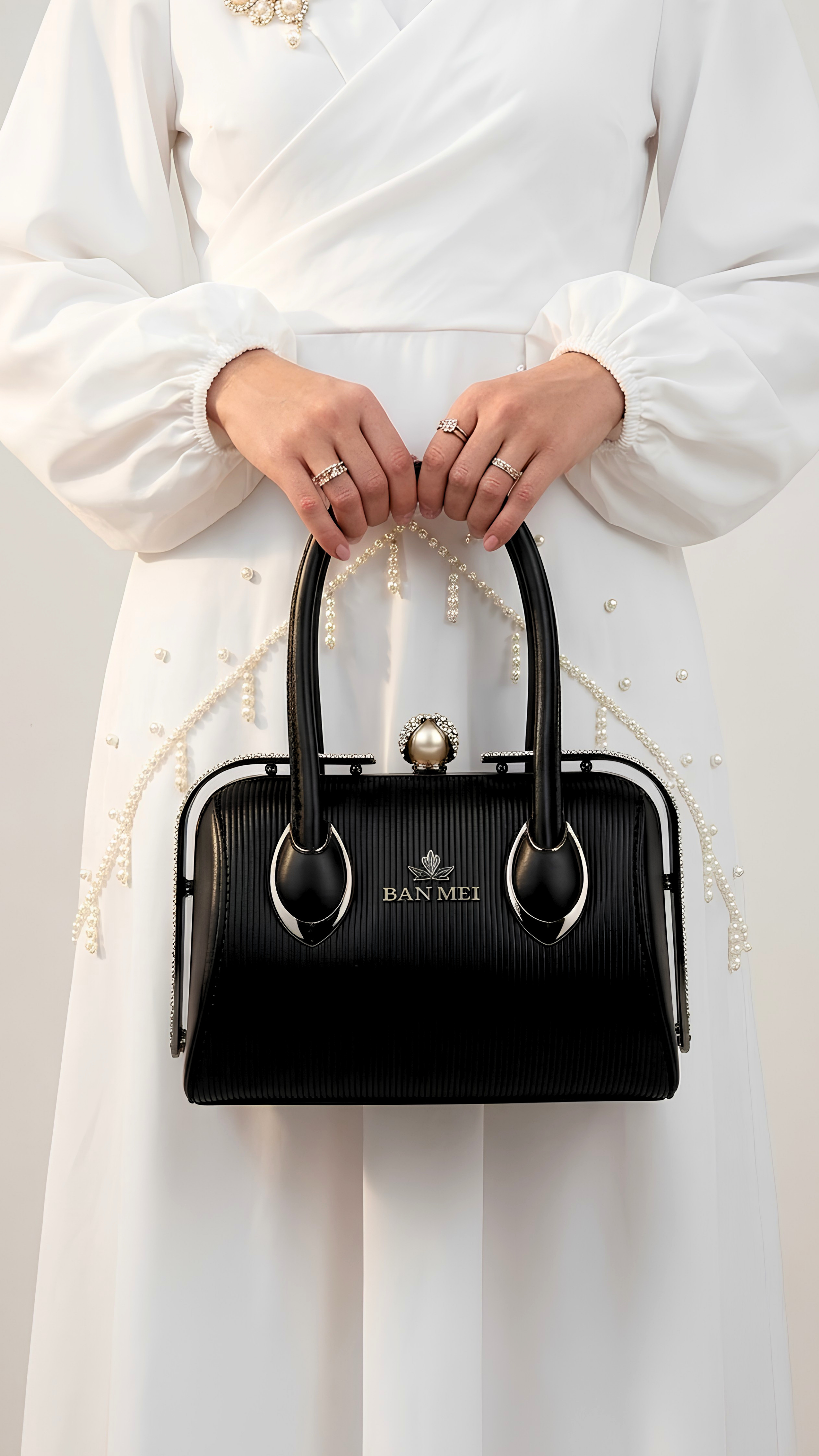 Premium white embossed leather handbag with pearl crystal clasp for Pakistani weddings