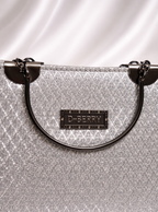 Sparkling silver diamond clutch with crystal detailing for Pakistani weddings