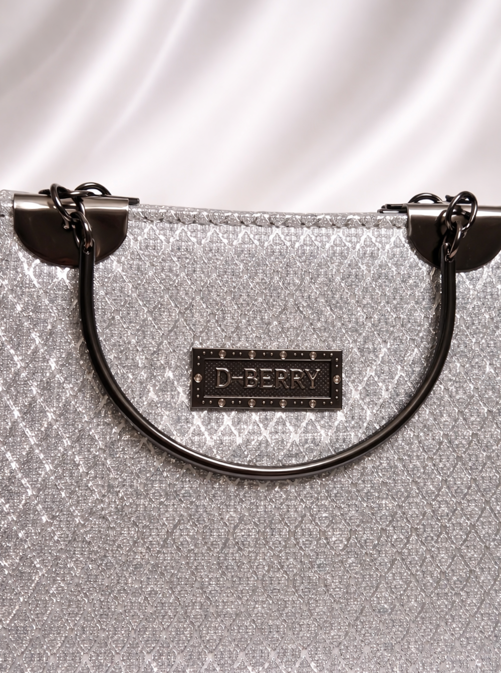 Sparkling silver diamond clutch with crystal detailing for Pakistani weddings