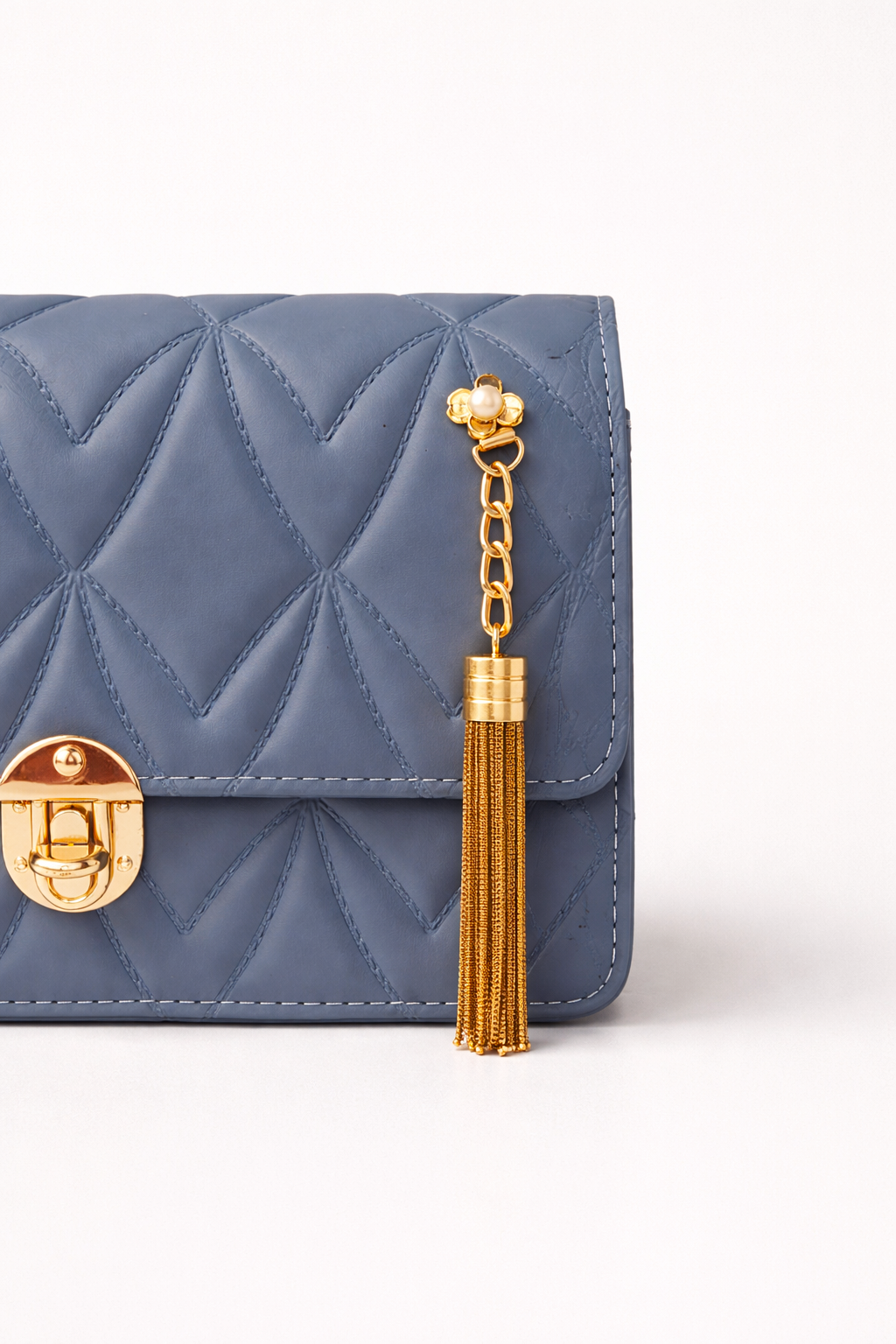 Elegant slate blue handbag in Pakistan with embossed texture, secure flap closure, and stylish look for everyday wear - Silslah Store