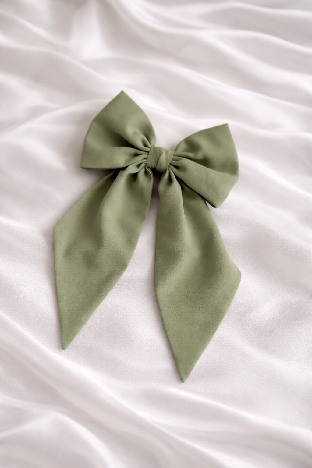 Large satin hair bow with elegant pearl center for girls eid and wedding hairstyles